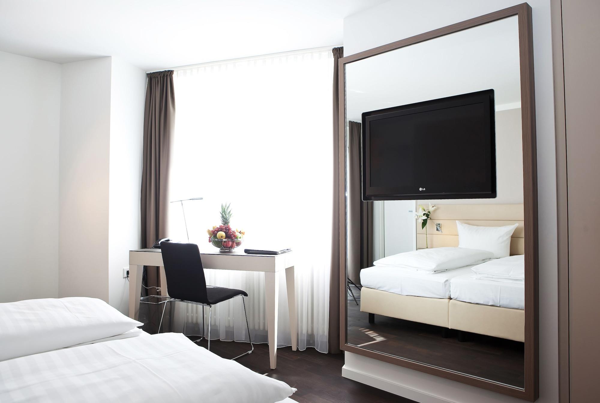 Manhattan Hotel Frankfurt am Main Quarto foto